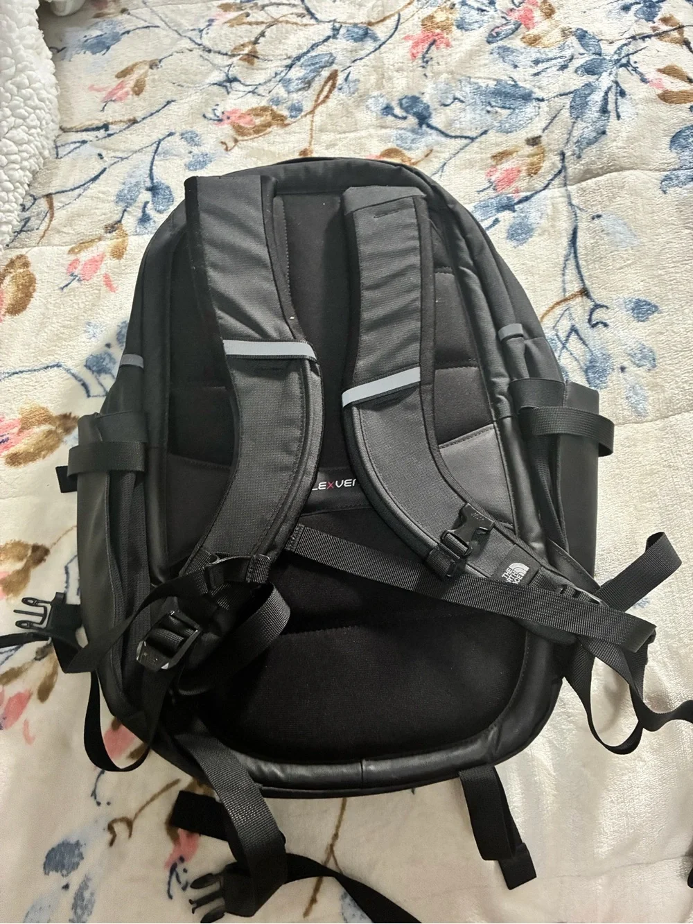 The North Face Black Backpack with Rose Gold Accents